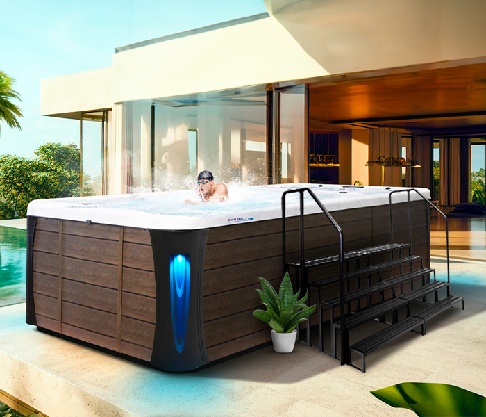 Calspas hot tub being used in a family setting - Candé